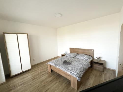 Posteľ alebo postele v izbe v ubytovaní apartmán Dream Residence