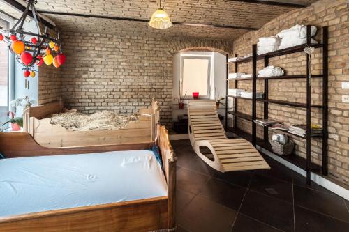 Cama o camas de una habitación en GL Suites