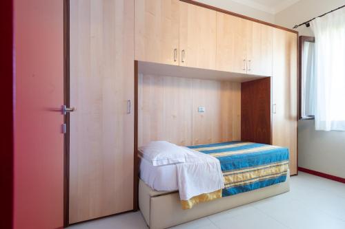 Ένα ή περισσότερα κρεβάτια σε δωμάτιο στο Delle Rose