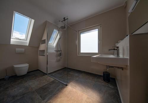 Ett badrum på Haus-amBrunnen