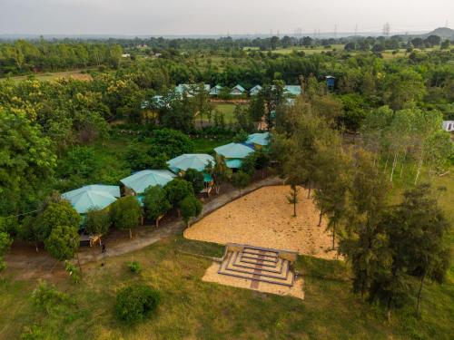 an overhead view of a park with tents at Vrindavan Gopala Resort in Jabalpur