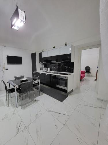 Kuchyňa alebo kuchynka v ubytovaní La casa di Titina