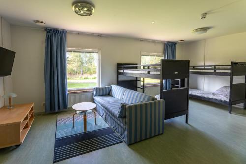 Postel nebo postele na pokoji v ubytování Systemairhallen Bed&Breakfast