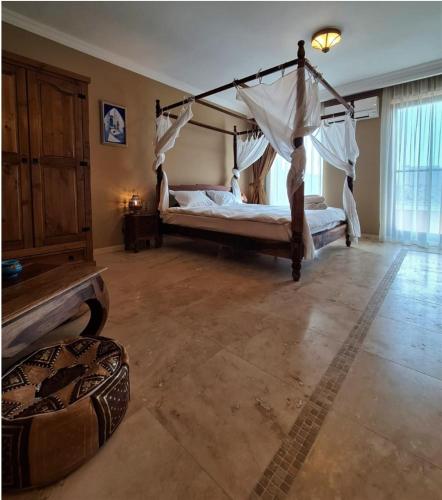 Postel nebo postele na pokoji v ubytování Kaleidoscope Boutique Hotel