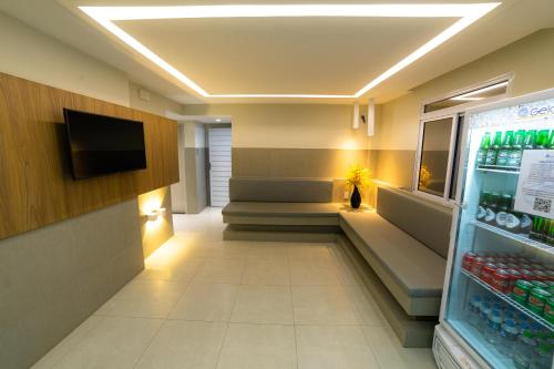 Televisyen dan/atau pusat hiburan di Hotel Pousada do Farol