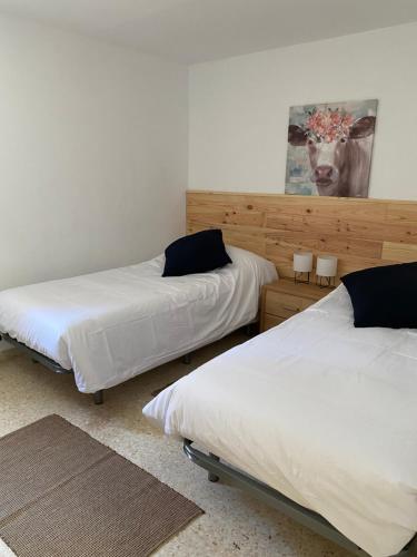 Ένα ή περισσότερα κρεβάτια σε δωμάτιο στο Casa Karodan