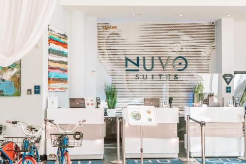 a store with a nuno shuttle sign on the wall at Nuvo Suites Hotel - Miami Doral in Miami