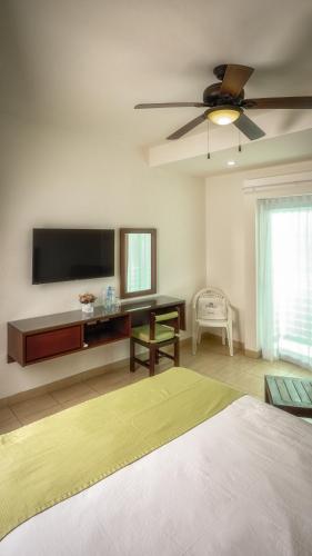 Кровать или кровати в номере Imperla Hotel