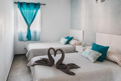 Katil atau katil-katil dalam bilik di Mirador del Atlántico
