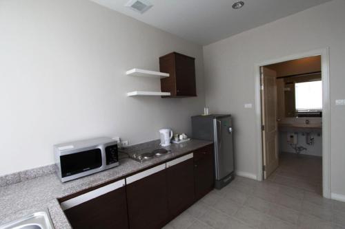 Η κουζίνα ή μικρή κουζίνα στο Baiyoke Ciao Hotel