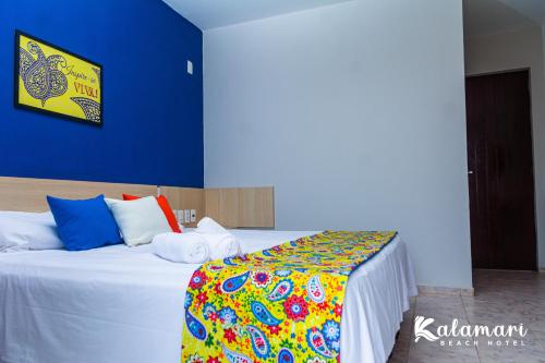 Ένα ή περισσότερα κρεβάτια σε δωμάτιο στο Kalamari Beach Hotel