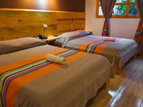 Cama o camas de una habitación en María Arte Hotel
