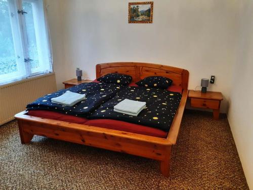 Postel nebo postele na pokoji v ubytování Chalupa V Mlýnkách
