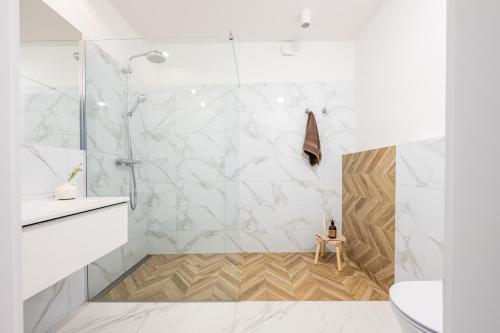 Kúpeľňa v ubytovaní Prestige Apartamenty Za Cieszynianką 1D
