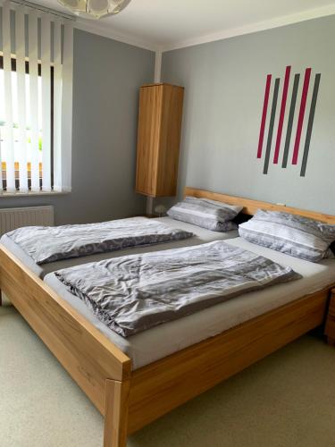 Ένα ή περισσότερα κρεβάτια σε δωμάτιο στο Haus Sonnenschein