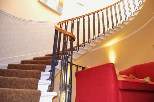 a row of stairs leading up to a balcony at The Salisbury Hotel in Edinburgh