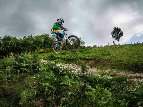 a person jumping a dirt bike in the air at Palacio de Yrisarri by IrriSarri Land in Igantzi