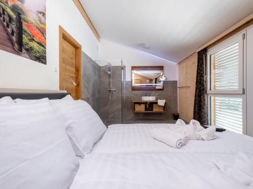 Postel nebo postele na pokoji v ubytování Haus Estelle