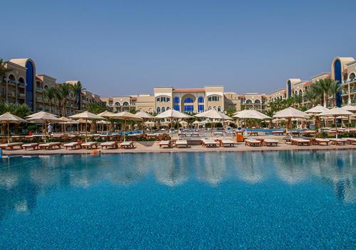 a hotel room with a large pool of water at Premier Le Reve Hotel & Spa Sahl Hasheesh - Adults Only 16 Years Plus in Hurghada
