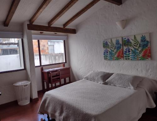 Postel nebo postele na pokoji v ubytování Casa Turística Camitas Inn