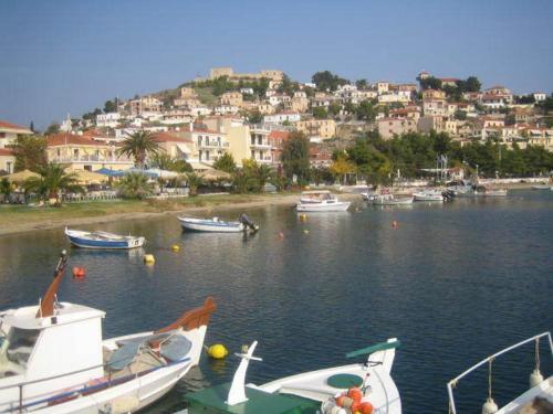 a group of boats in a body of water at 85 sqm Apartments New Panorama ELECTRIC CAR ΦΩΡΤΗΣΗΣ STATION in Paralion astros