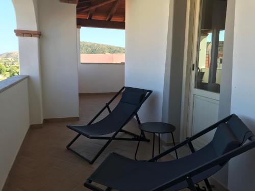 Un balcón o terraza de Residenza Limpiddu