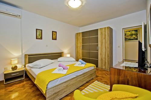 Postel nebo postele na pokoji v ubytování Anna in Hvar * Mittel-Dalmatien