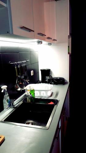 a kitchen with a sink and a counter top at Casa Katina , villa in Lagana, Agrilia area in Laganas