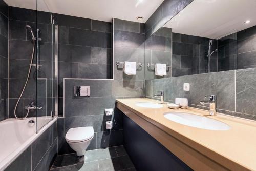 Ванная комната в Hotel Rosanna by Alpeffect Hotels