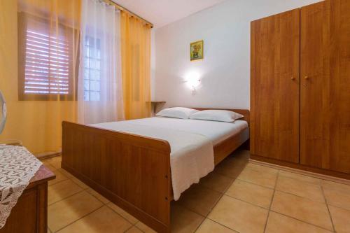 Posteľ alebo postele v izbe v ubytovaní Apartments in Crikvenica 39341