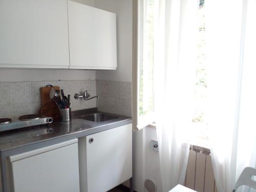 Kuchyň nebo kuchyňský kout v ubytování CASA ADRI. Comoda, accessibile, luminosa.