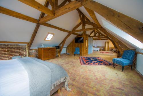 En eller flere senge i et værelse på A L'ecole Buissonniere