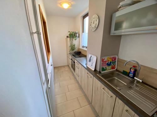 a kitchen with a sink and a counter at Monteurunterkunft Nesselröden in Duderstadt