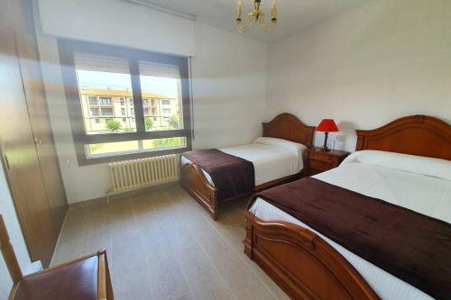 Postel nebo postele na pokoji v ubytování La Casita de Irene