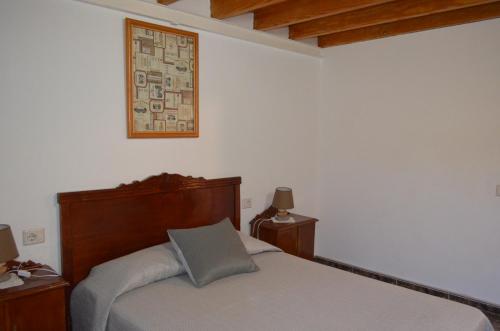 מיטה או מיטות בחדר ב-Casa de Diego y Mela