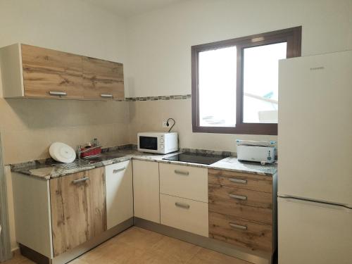 Kuchyň nebo kuchyňský kout v ubytování Bimbache Home