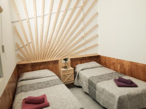 Postel nebo postele na pokoji v ubytování Bimbache Home