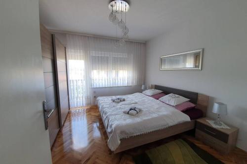 Krevet ili kreveti u jedinici u okviru objekta Apartman Robert ***