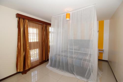 Ένα μπάνιο στο Lux Suites Milimani Suites Nakuru