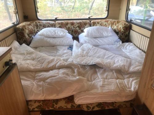 Ένα ή περισσότερα κρεβάτια σε δωμάτιο στο Tisza beach Wild Camping 2