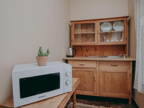 Kuchyň nebo kuchyňský kout v ubytování Beesdam Guesthouse