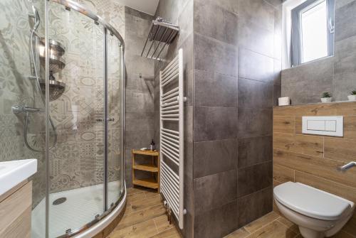 Koupelna v ubytování Aviatik apartments