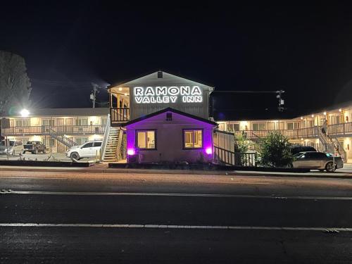 a building with purple lights on the side of it at Ramona Valley Inn in Ramona