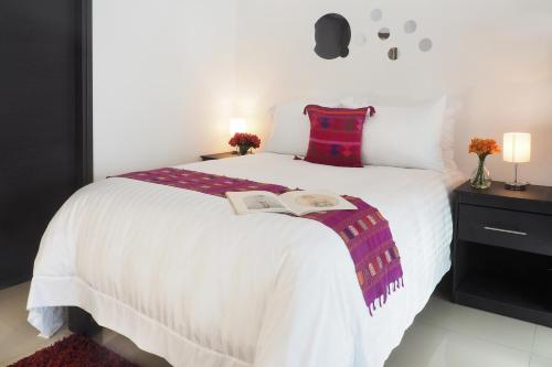 Postel nebo postele na pokoji v ubytování Loft Sinaloa By The Local Way