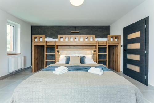 Postel nebo postele na pokoji v ubytování Premium apartman Lipno