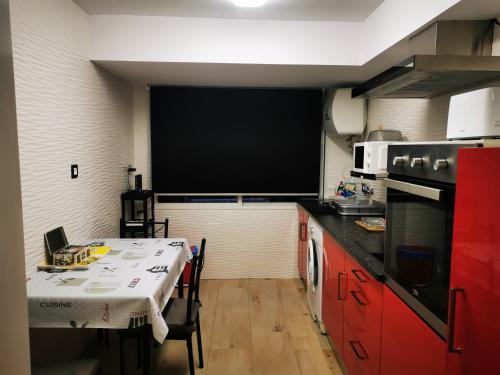 Η κουζίνα ή μικρή κουζίνα στο Apartamento GIJON LOS CAMPOS
