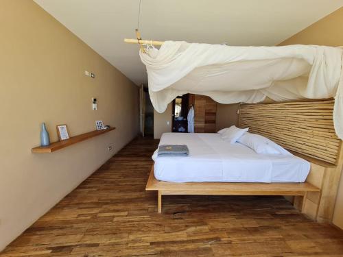 Кровать или кровати в номере Alma Loft
