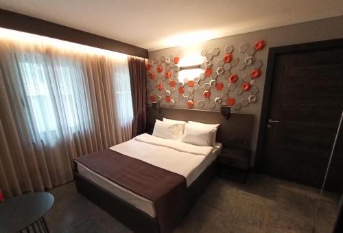 Ένα ή περισσότερα κρεβάτια σε δωμάτιο στο Days Hotel by Wyndham Ankara Cankaya