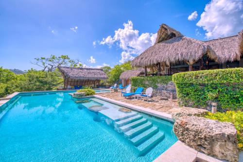 an image of a swimming pool at a resort at Morgan's Rock in San Juan del Sur
