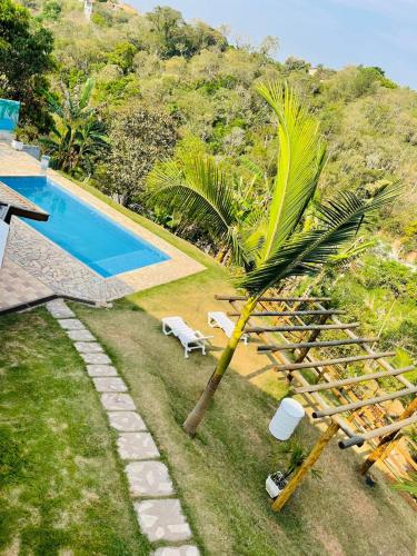 Kolam renang di atau dekat dengan Chacara recantobrito